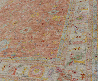 Vibrant Floral Medley on Salmon Pink Hand - Knotted Rug by Keivan Woven Arts. rug / AN - 149682, Turkish 21st Century. Measures: 10'0 x 12'11 The rug showcase's a beautifully woven rug with a vibrant and colorful design on a warm salmon pink backgro... - Keivan Woven ArtsAN - 149682 - 16412Rug