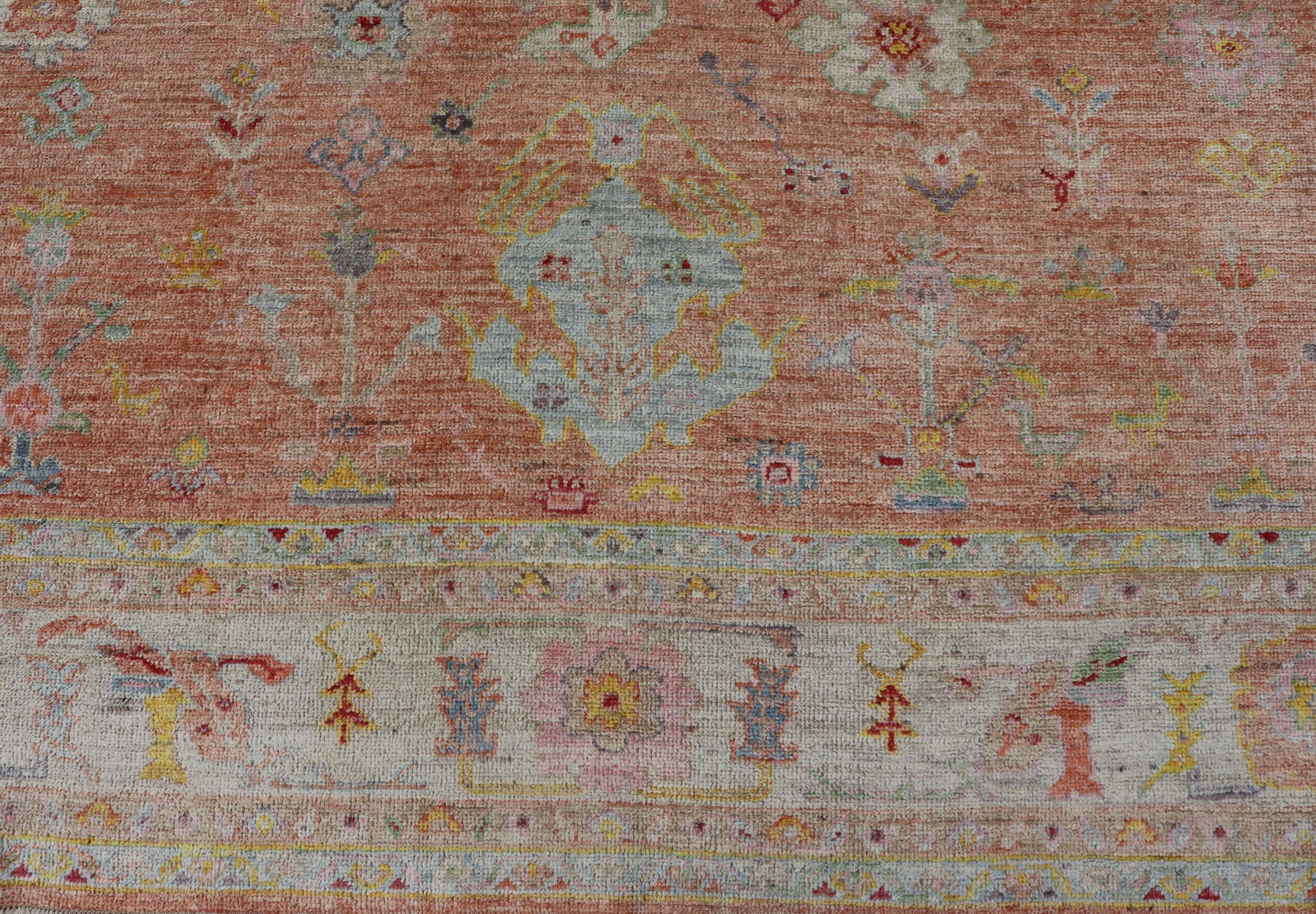 Vibrant Floral Medley on Salmon Pink Hand - Knotted Rug by Keivan Woven Arts. rug / AN - 149682, Turkish 21st Century. Measures: 10'0 x 12'11 The rug showcase's a beautifully woven rug with a vibrant and colorful design on a warm salmon pink backgro... - Keivan Woven ArtsAN - 149682 - 16412Rug