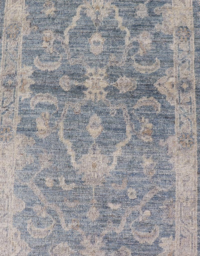 Angora Turkish Oushak Runner with Floral Design and Medium Blue and Gray Border This Oushak Runner is rendered in a medium blue background and a light gray border. The design is an arabesque - like floral pattern, cased within a banded sub - floral ... - Keivan Woven ArtsAN - 149801 - 19935Rug