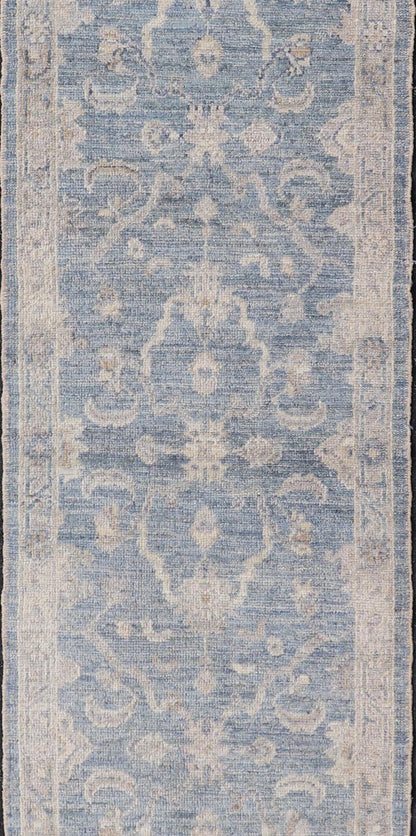 Angora Turkish Oushak Runner with Floral Design and Medium Blue and Gray Border This Oushak Runner is rendered in a medium blue background and a light gray border. The design is an arabesque - like floral pattern, cased within a banded sub - floral ... - Keivan Woven ArtsAN - 149801 - 19935Rug