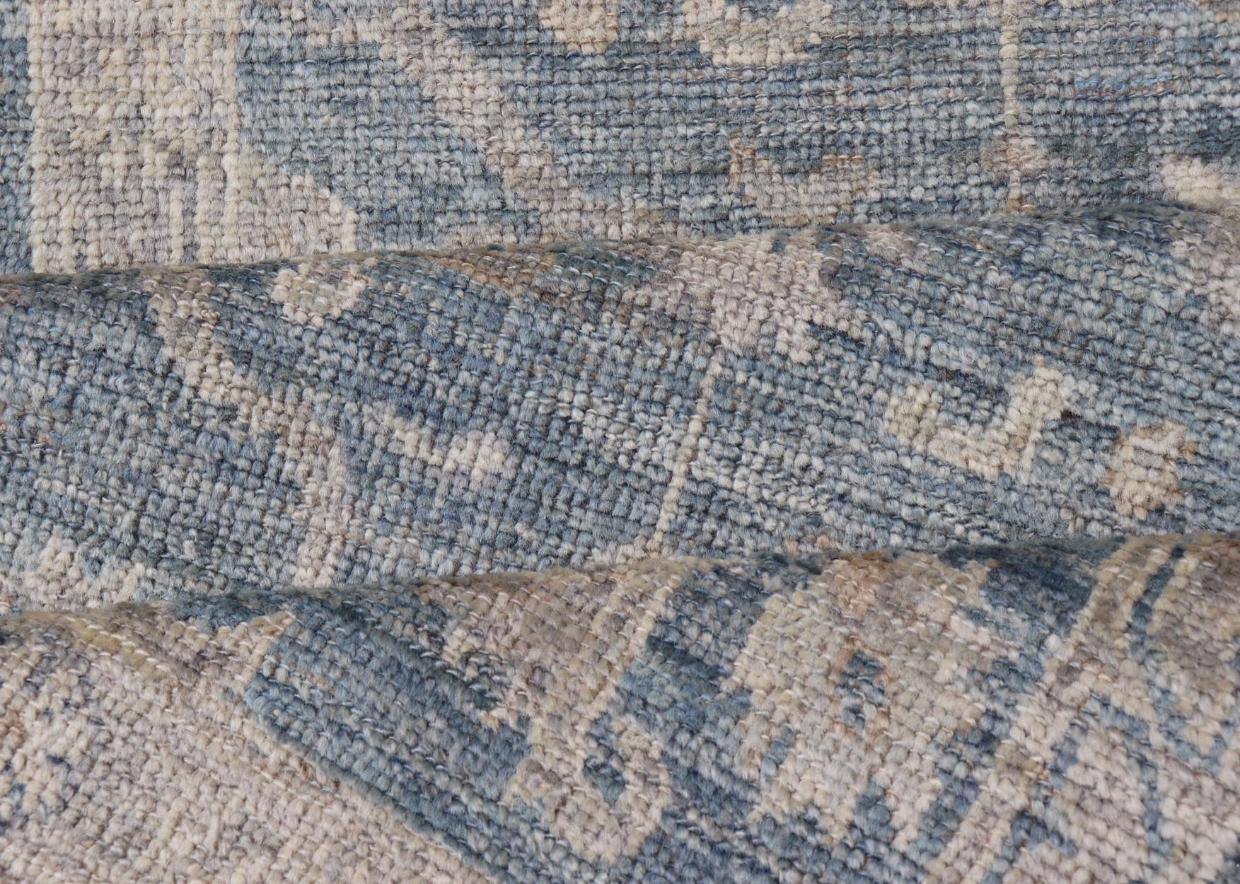 Angora Turkish Oushak Runner with Floral Design and Medium Blue and Gray Border This Oushak Runner is rendered in a medium blue background and a light gray border. The design is an arabesque - like floral pattern, cased within a banded sub - floral ... - Keivan Woven ArtsAN - 149801 - 19935Rug