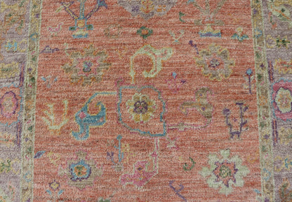 Hand Knotted Turkish Floral Oushak with Orange Background and Lilac Border This very unique piece has a wide array of bright colors, starting with a faded orange background and a light lilac border, showcasing fuchsia, electric blue, violet, or... - Keivan Woven ArtsAN - 149896 - 19941Rug