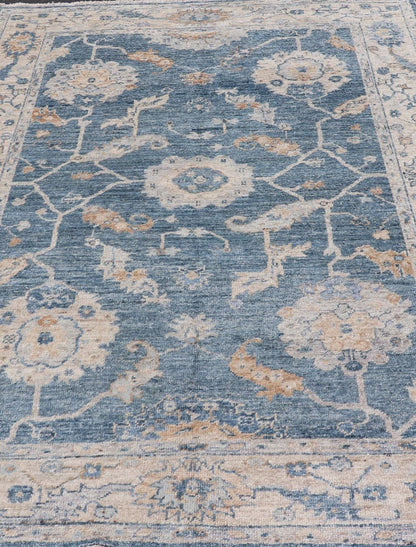 Angora Turkish Oushak Floral Design in Blue, Creams and Mocha Colors This angora Oushak has a unique floral design on top of a faded blue background with a slight cream and mocha undertone. Keivan Woven Arts rug AN - 150778 Measures; 6... - Keivan Woven ArtsAN - 150778 - 19953Rug