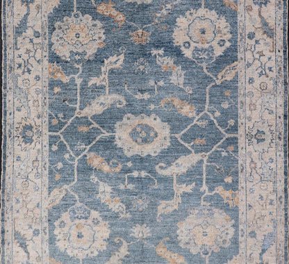 Angora Turkish Oushak Floral Design in Blue, Creams and Mocha Colors This angora Oushak has a unique floral design on top of a faded blue background with a slight cream and mocha undertone. Keivan Woven Arts rug AN - 150778 Measures; 6... - Keivan Woven ArtsAN - 150778 - 19953Rug