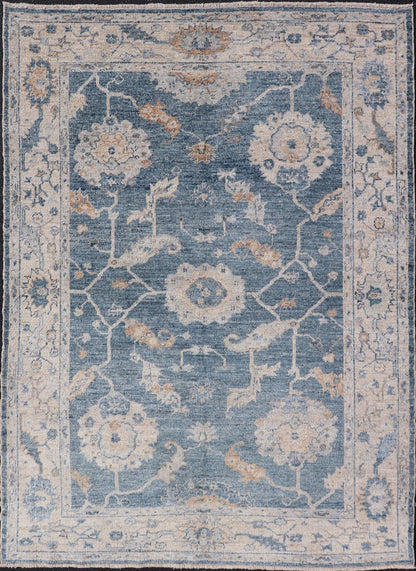 Angora Turkish Oushak Floral Design in Blue, Creams and Mocha Colors This angora Oushak has a unique floral design on top of a faded blue background with a slight cream and mocha undertone. Keivan Woven Arts rug AN - 150778 Measures; 6... - Keivan Woven ArtsAN - 150778 - 19953Rug