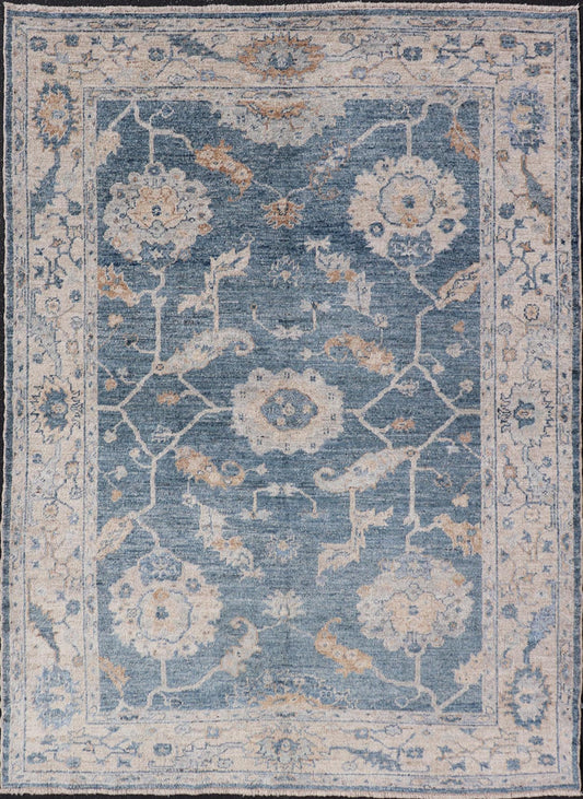 Angora Turkish Oushak Floral Design in Blue, Creams and Mocha Colors This angora Oushak has a unique floral design on top of a faded blue background with a slight cream and mocha undertone. Keivan Woven Arts rug AN - 150778 Measures; 6... - Keivan Woven ArtsAN - 150778 - 19953Rug
