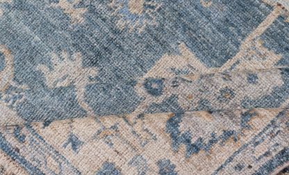 Angora Turkish Oushak Floral Design in Blue, Creams and Mocha Colors This angora Oushak has a unique floral design on top of a faded blue background with a slight cream and mocha undertone. Keivan Woven Arts rug AN - 150778 Measures; 6... - Keivan Woven ArtsAN - 150778 - 19953Rug