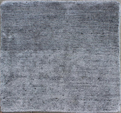 Color A A monochromatic composition emphasizes the streamlined design of this contemporary rug, the sheered down pile evokes a minimalist textured aesthetic. Faint pops of color shine against a solid field in this one - of - a - kind rug, each rug is org... - Keivan Woven ArtsAPE - 1 - MAR - A - 6484Rug