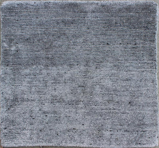Color A A monochromatic composition emphasizes the streamlined design of this contemporary rug, the sheered down pile evokes a minimalist textured aesthetic. Faint pops of color shine against a solid field in this one - of - a - kind rug, each rug is org... - Keivan Woven ArtsAPE - 1 - MAR - A - 6484Rug