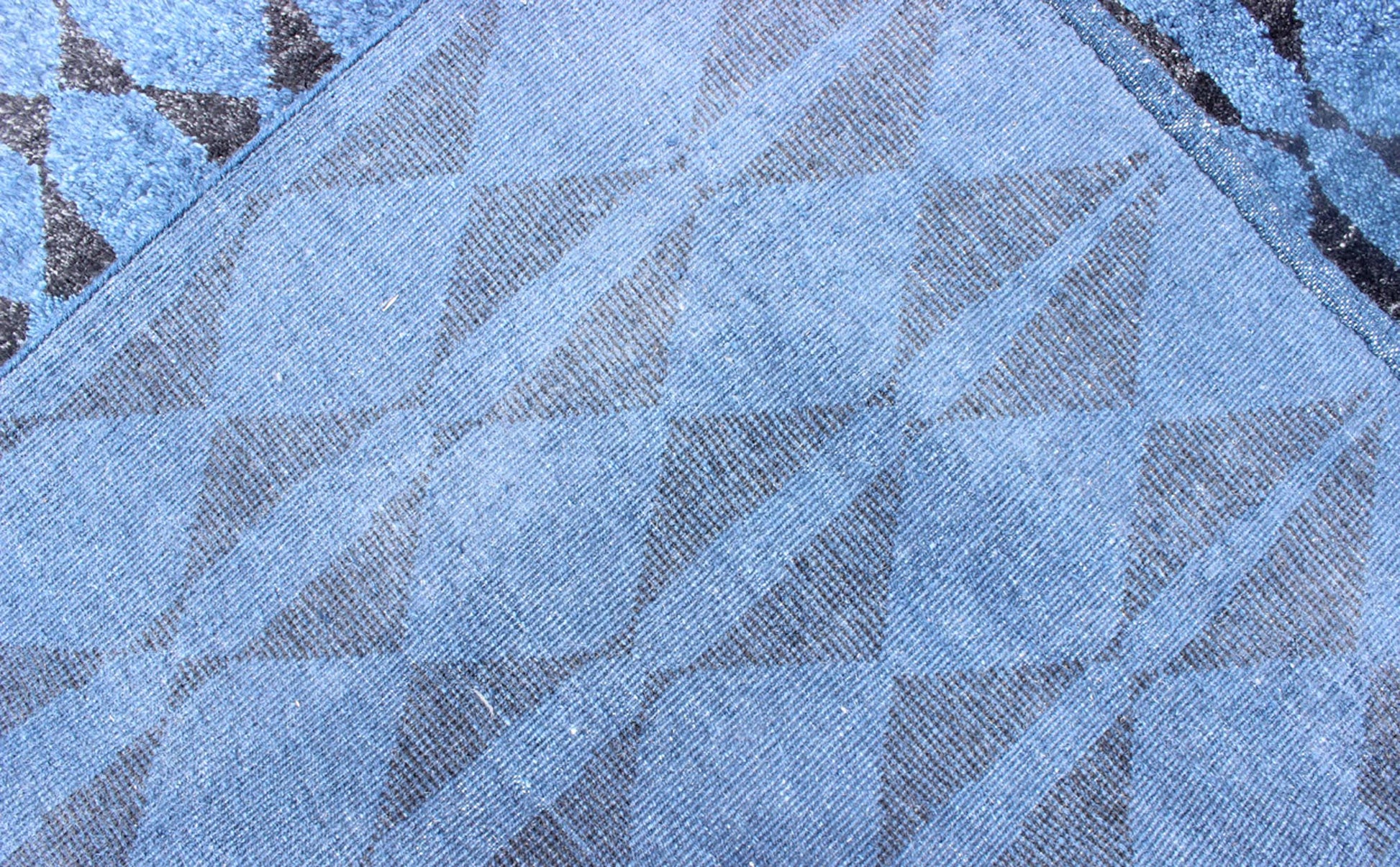 Blue and Black Moroccan Tribal Rug. This fascinating Tribal styled Moroccan rug hailing from India features an all - over diamond and circular patterning rendered in blue and black, making this a great piece for modern, transitional and casual in... - Keivan Woven ArtsAPE - 180 - 9672 - 7447Rug