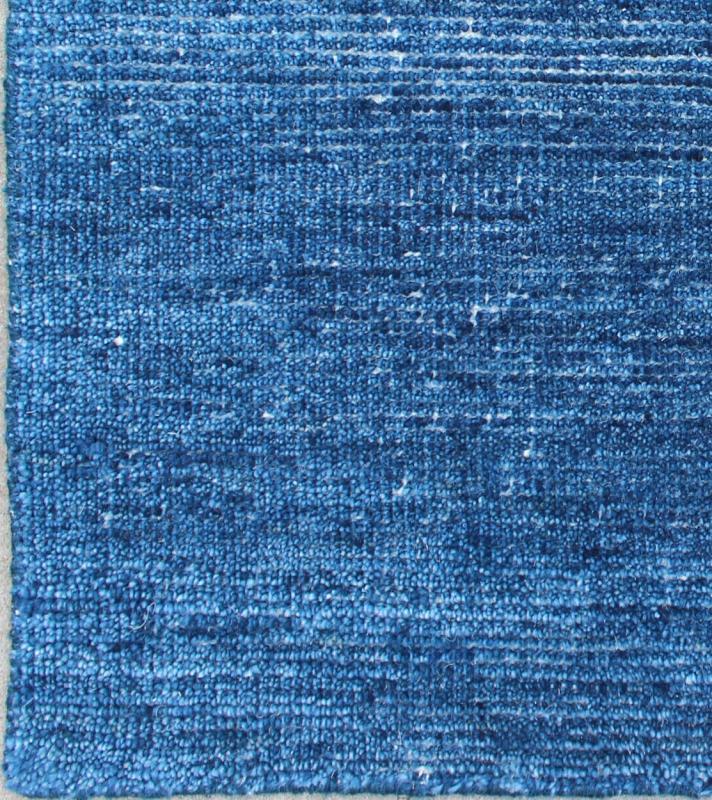 Color V A monochromatic composition emphasizes the streamlined design of this contemporary rug, the sheered down pile evokes a minimalist textured aesthetic. Faint pops of color shine against a solid field in this one - of - a - kind rug, each rug is organic... - Keivan Woven ArtsAPE - 2 - MAR - V - 6486Rug