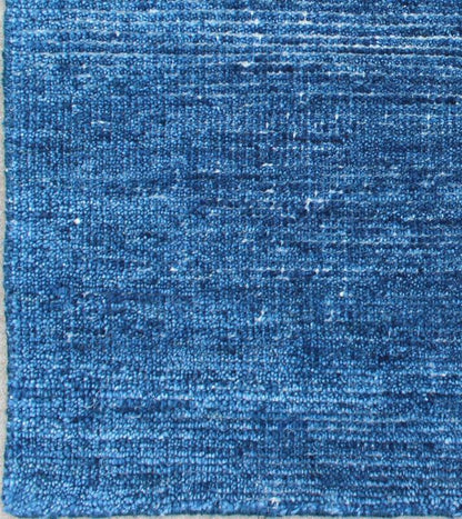 Color V A monochromatic composition emphasizes the streamlined design of this contemporary rug, the sheered down pile evokes a minimalist textured aesthetic. Faint pops of color shine against a solid field in this one - of - a - kind rug, each rug is organic... - Keivan Woven ArtsAPE - 2 - MAR - V - 6486Rug