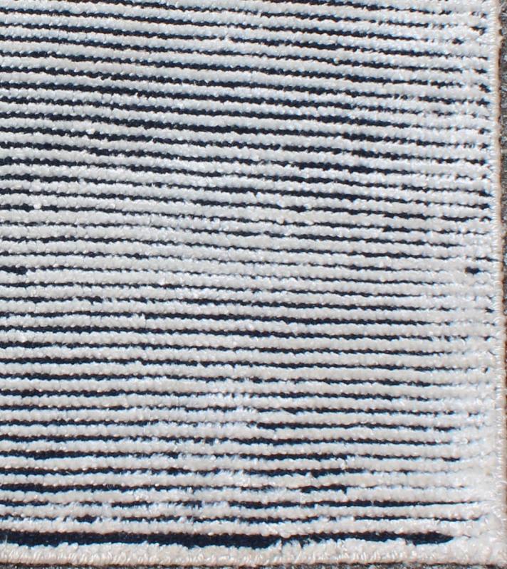 S - 2 A monochromatic composition emphasizes the streamlined design of this contemporary rug, the sheered down pile evokes a minimalist textured aesthetic. Faint pops of color shine against a solid field in this one - of - a - kind rug, each rug is organically... - Keivan Woven ArtsAPE - 38 - MAR - S - 6580Rug
