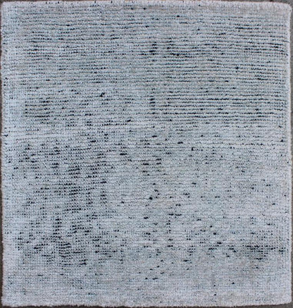 Color S A monochromatic composition emphasizes the streamlined design of this contemporary rug, the sheered down pile evokes a minimalist textured aesthetic. Faint pops of color shine against a solid field in this one - of - a - kind rug, each rug is organic... - Keivan Woven ArtsAPE - 4 - MAR - S - 6490Rug
