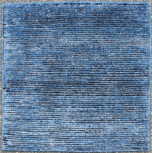 COLOR - J A monochromatic composition emphasizes the streamlined design of this contemporary rug, the sheered down pile evokes a minimalist textured aesthetic. Faint pops of color shine against a solid field in this one - of - a - kind rug, each rug is organic... - Keivan Woven ArtsAPE - 40 - MAR - J - 6582Rug