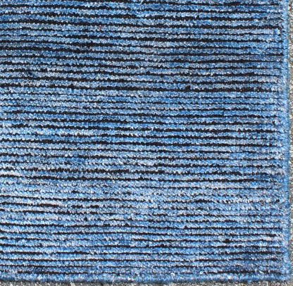 COLOR - J A monochromatic composition emphasizes the streamlined design of this contemporary rug, the sheered down pile evokes a minimalist textured aesthetic. Faint pops of color shine against a solid field in this one - of - a - kind rug, each rug is organic... - Keivan Woven ArtsAPE - 40 - MAR - J - 6582Rug