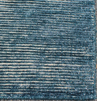 COLOR - L A monochromatic composition emphasizes the streamlined design of this contemporary rug, the sheered down pile evokes a minimalist textured aesthetic. Faint pops of color shine against a solid field in this one - of - a - kind rug, each rug is organic... - Keivan Woven ArtsAPE - 42 - MAR - L - 6584Rug