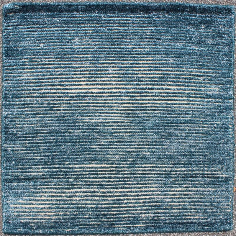 COLOR - L A monochromatic composition emphasizes the streamlined design of this contemporary rug, the sheered down pile evokes a minimalist textured aesthetic. Faint pops of color shine against a solid field in this one - of - a - kind rug, each rug is organic... - Keivan Woven ArtsAPE - 42 - MAR - L - 6584Rug