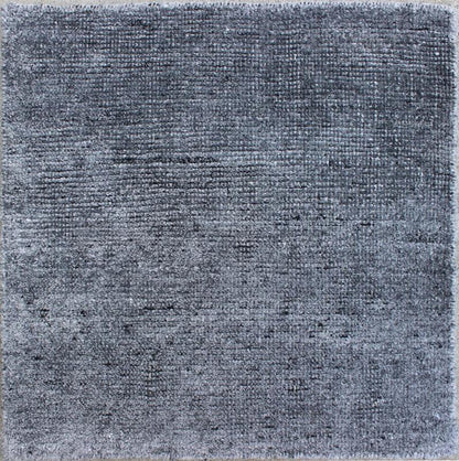 Color N A monochromatic composition emphasizes the streamlined design of this contemporary rug, the sheered down pile evokes a minimalist textured aesthetic. Faint pops of color shine against a solid field in this one - of - a - kind rug, each rug is organic... - Keivan Woven ArtsAPE - 7 - MAR - N - 6494Rug
