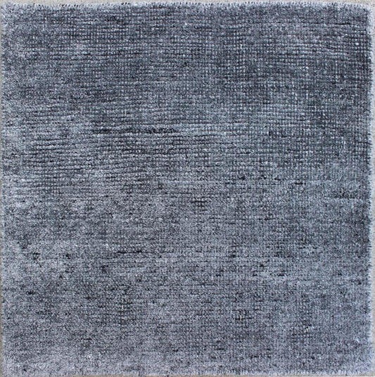 Color N A monochromatic composition emphasizes the streamlined design of this contemporary rug, the sheered down pile evokes a minimalist textured aesthetic. Faint pops of color shine against a solid field in this one - of - a - kind rug, each rug is organic... - Keivan Woven ArtsAPE - 7 - MAR - N - 6494Rug
