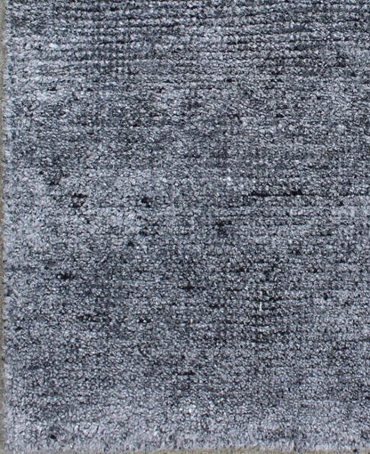 Color N A monochromatic composition emphasizes the streamlined design of this contemporary rug, the sheered down pile evokes a minimalist textured aesthetic. Faint pops of color shine against a solid field in this one - of - a - kind rug, each rug is organic... - Keivan Woven ArtsAPE - 7 - MAR - N - 6494Rug