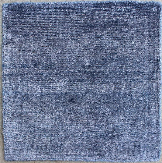 Color K A monochromatic composition emphasizes the streamlined design of this contemporary rug, the sheered down pile evokes a minimalist textured aesthetic. Faint pops of color shine against a solid field in this one - of - a - kind rug, each rug is organic... - Keivan Woven ArtsAPE - 8 - MAR - K - 6496Rug