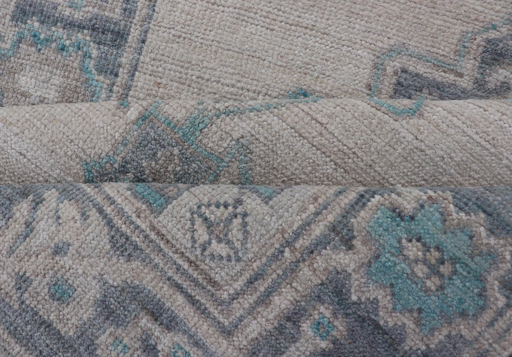 Modern Oushak with Off White Background with A Large Tribal Medallion in Teal. Measures: 3'1 x 5'3 This Oushak featuring a center tribal medallion in the center of off white background and the light gray border also. Colors are gray, cre... - Keivan Woven ArtsAWR - 10719 - 21541Rug