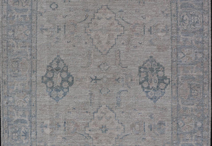 Hand - Knotted Oushak with A Light Blue Background and Tribal Motifs. Keivan Woven Arts; rug AWR - 10729 Country of Origin: Afghanistan Type: Oushak Design: Floral, All - Over Abstract - Tribal Measures: 4'0 x 5'4 This Oushak presents centered motif di... - Keivan Woven ArtsAWR - 10729 - 21627Rug