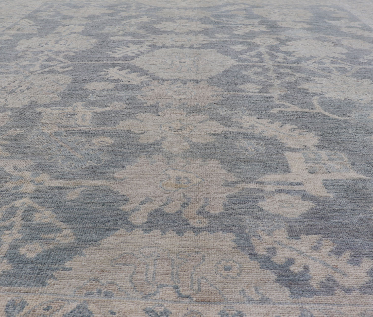 Measures: 8'2 x 9'11 Modern Oushak with Large Floral Motifs with Cream, Blue, and Steel Blue. Keivan Woven Arts; rug AWR - 12099 Country of Origin: Afghanistan Type: Oushak Design: Floral, All - Over Abstract - Tribal 21st century. This modern Ou... - Keivan Woven ArtsAWR - 12099 - 23372Rug