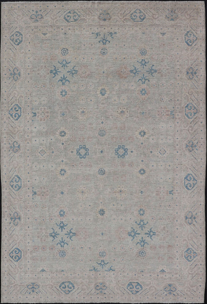 Measures: 6'4 x 9'11 Modern All - Over Khotan design rug with Light Background and Blue Colors. Keivan Woven Arts rug AWR - 12122 Country of Origin: Afghanistan Type: Oushak Design: Floral, All - Over, Abstract Floral. This Oushak was hand - knotted... - Keivan Woven ArtsAWR - 12122 - 23199Rug