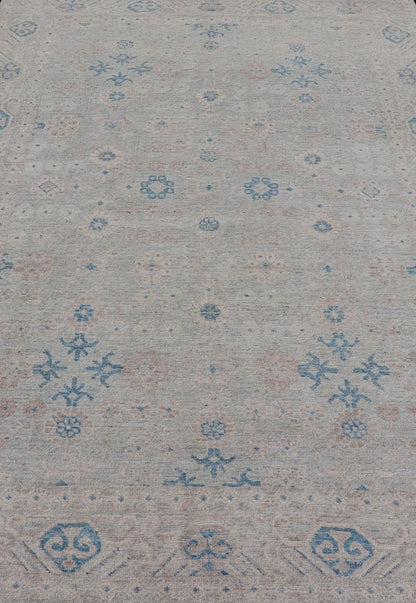 Measures: 6'4 x 9'11 Modern All - Over Khotan design rug with Light Background and Blue Colors. Keivan Woven Arts rug AWR - 12122 Country of Origin: Afghanistan Type: Oushak Design: Floral, All - Over, Abstract Floral. This Oushak was hand - knotted... - Keivan Woven ArtsAWR - 12122 - 23199Rug