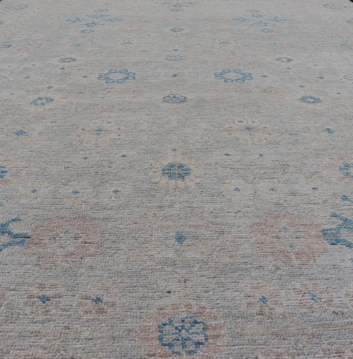 Measures: 6'4 x 9'11 Modern All - Over Khotan design rug with Light Background and Blue Colors. Keivan Woven Arts rug AWR - 12122 Country of Origin: Afghanistan Type: Oushak Design: Floral, All - Over, Abstract Floral. This Oushak was hand - knotted... - Keivan Woven ArtsAWR - 12122 - 23199Rug