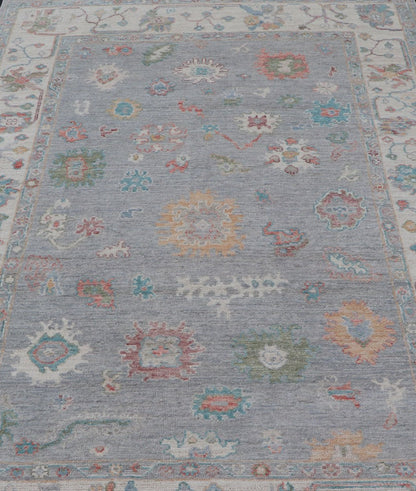 Measures: 5'8 x 9'0 Hand Knotted Floral Modern Oushak With a Taupe Background And Multi - Colors. Keivan Woven Arts; rug AWR - 12167 / Country of Origin: Afghanistan Type: Oushak Design: Floral, All - Over, Abstract This modern casual floral Ousha... - Keivan Woven ArtsAWR - 12167 - 23205Rug