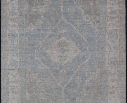 Measures: 5'10 x 8'9 Modern Oushak with a Light Blue - Gray Background with Medallion & Tribal Motifs. Country of Origin: Afghanistan; Type: Oushak; Design: Medallion, Tribal Medallion, All - Over; Keivan Woven Arts: rug AWR - 12170. 21st Century. Th... - Keivan Woven ArtsAWR - 12170 - 23211