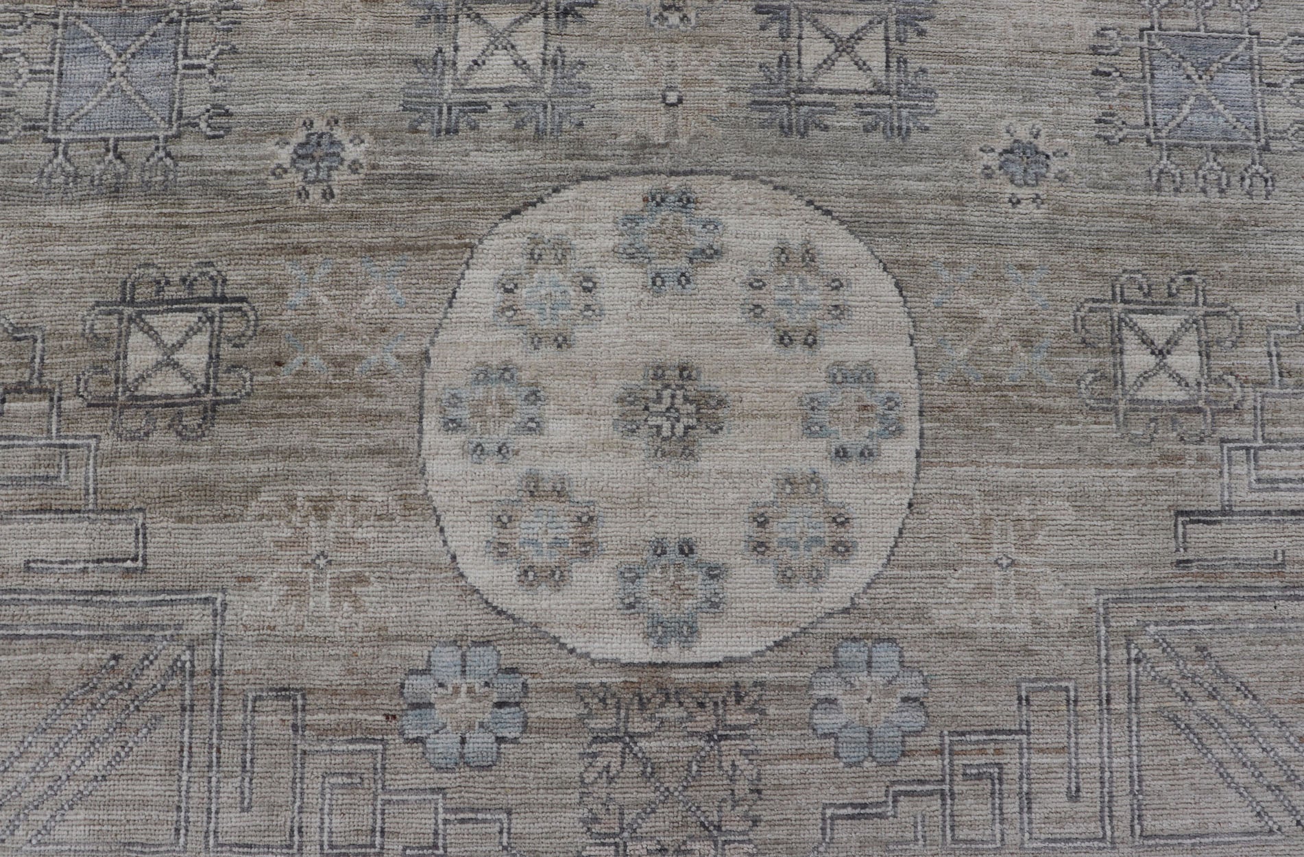 Measures: 6'0 x 9'1 Khotan Design Rug with Circular Medallion in Light Green, Light Blue, and Cream. Keivan Woven Arts , rug/AWR - 12172 country of origin / type: Afghanistan / Khotan. This Khotan features a geometric all - over design flanked b... - Keivan Woven ArtsAWR - 12172 - 23217