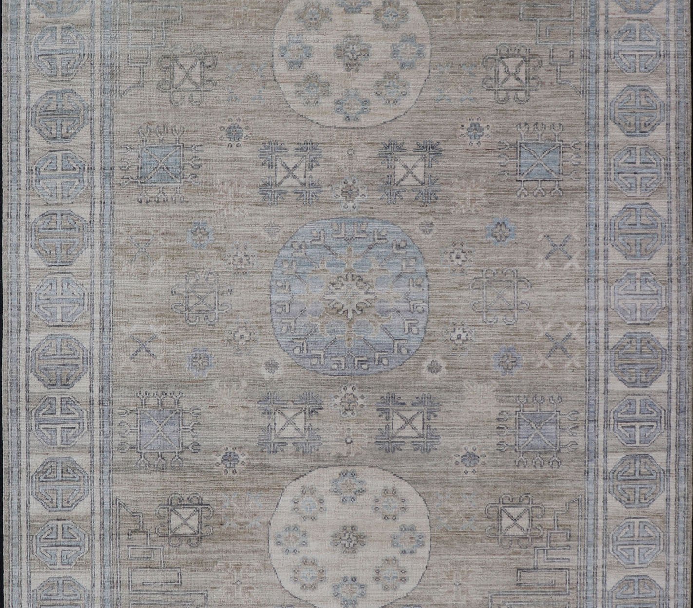 Measures: 6'0 x 9'1 Khotan Design Rug with Circular Medallion in Light Green, Light Blue, and Cream. Keivan Woven Arts , rug/AWR - 12172 country of origin / type: Afghanistan / Khotan. This Khotan features a geometric all - over design flanked b... - Keivan Woven ArtsAWR - 12172 - 23217