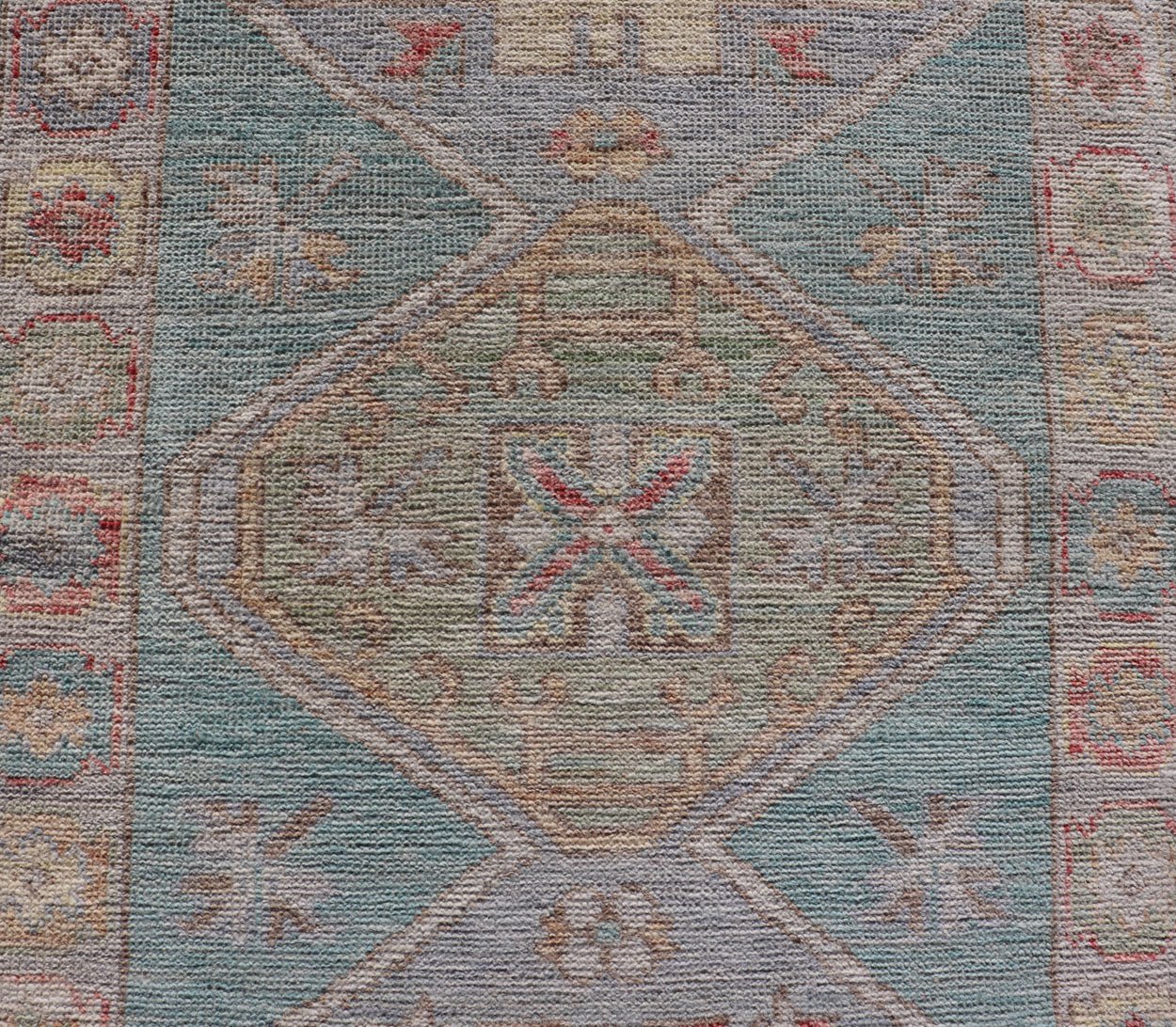 Measures: 2'5 x 6'5 Modern Small Oushak Runner with Teal - Blue Background and Medallion Motif. Keivan Woven Arts; rug AWR - 12192 Country of Origin: Afghanistan Type: Oushak Circa 2020 - This contemporary runner showcasing the distinct large... - Keivan Woven ArtsAWR - 12192 - 23223