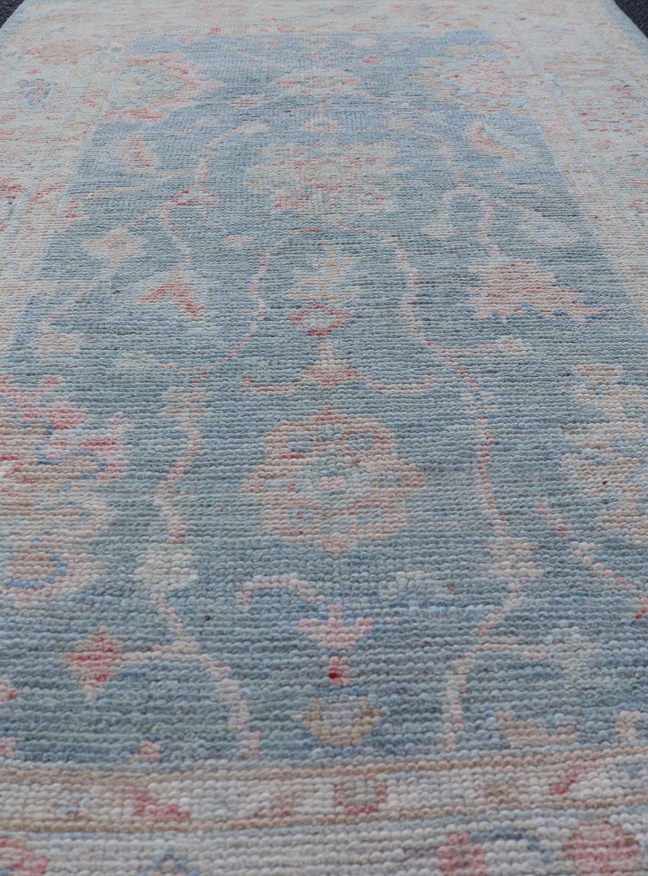 Measures:2'11 x 5'8 Modern Oushak Rug with a Light Blue Field With All - Over Floral Motifs With Cream. Keivan Woven Arts; rug AWR - 12202 Country of Origin: Afghanistan Type: Oushak Design: All - Over, Floral. Hand - Knotted in wool this piece holds c... - Keivan Woven ArtsAWR - 12202 - 23229Rug
