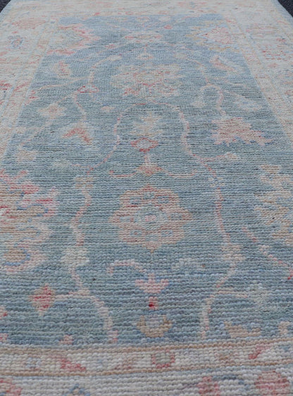 Measures:2'11 x 5'8 Modern Oushak Rug with a Light Blue Field With All - Over Floral Motifs With Cream. Keivan Woven Arts; rug AWR - 12202 Country of Origin: Afghanistan Type: Oushak Design: All - Over, Floral. Hand - Knotted in wool this piece holds c... - Keivan Woven ArtsAWR - 12202 - 23229Rug