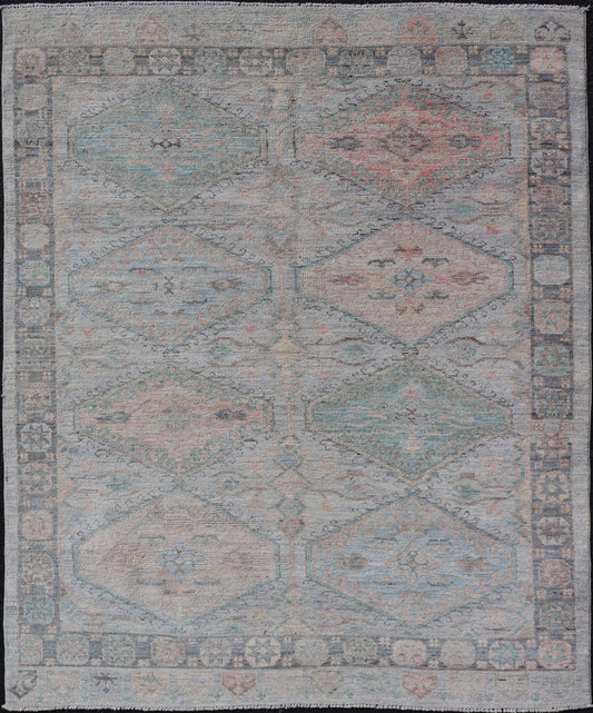 Measures: 4'11 x 6'3 Large Medallion Design Modern Oushak on a Light Blue Field With Multi Colors. Keivan Woven Arts; rug AWR - 12297 Country of Origin: Afghanistan Type: Oushak Circa 2020 This modern Oushak features large medallions in the cente... - Keivan Woven ArtsAWR - 12297 - 23235Rug