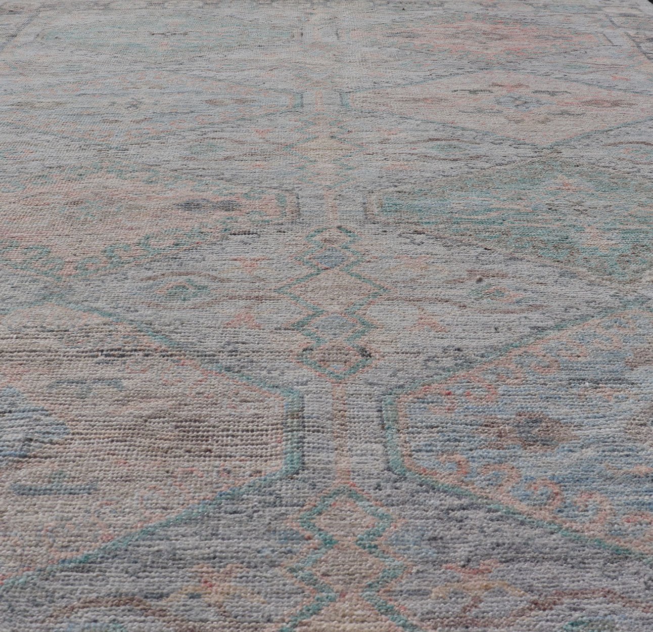 Measures: 4'11 x 6'3 Large Medallion Design Modern Oushak on a Light Blue Field With Multi Colors. Keivan Woven Arts; rug AWR - 12297 Country of Origin: Afghanistan Type: Oushak Circa 2020 This modern Oushak features large medallions in the cente... - Keivan Woven ArtsAWR - 12297 - 23235Rug