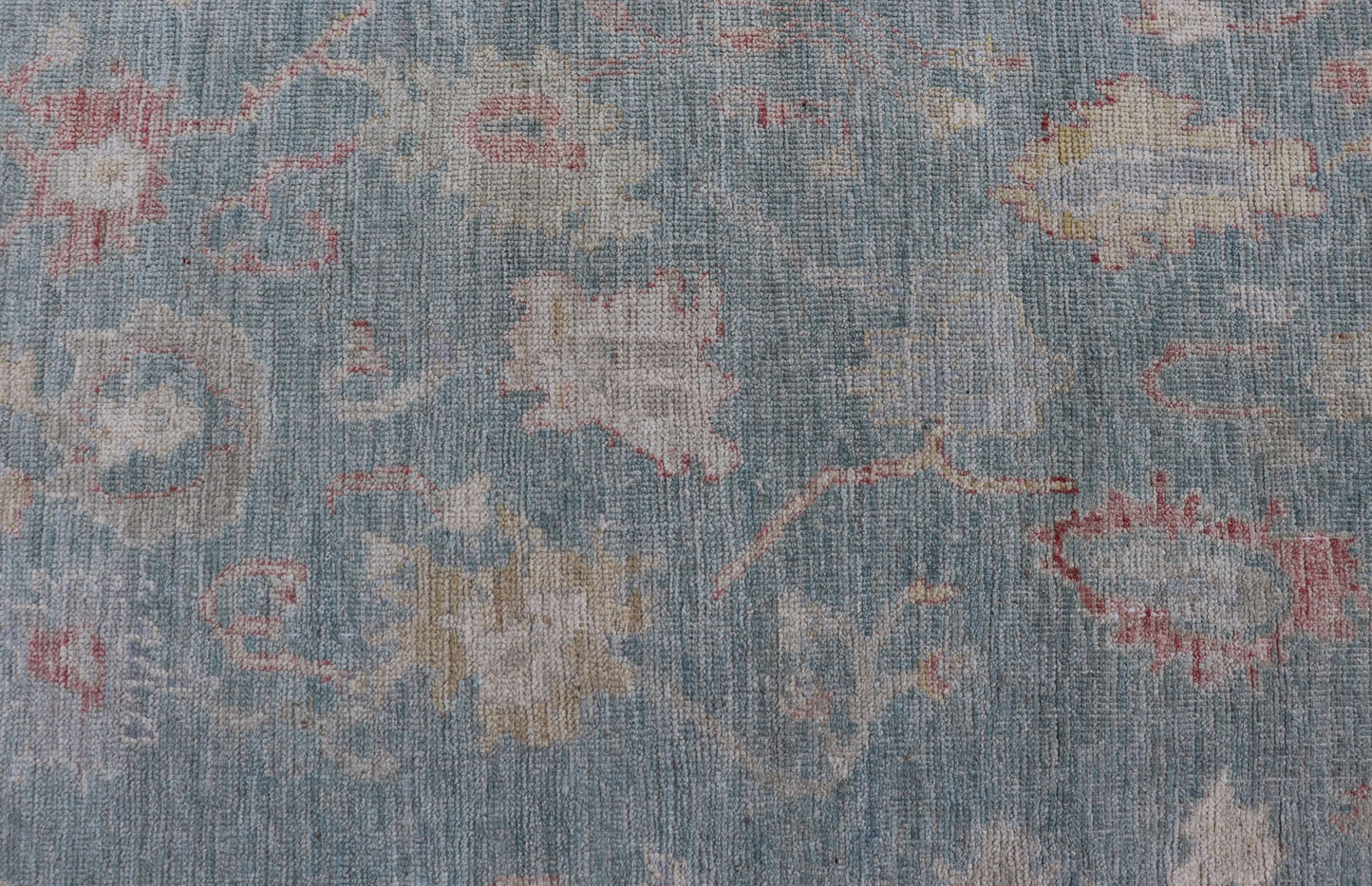 Measures: 3'11 x 5'11 Modern Oushak Rug with a Light Blue - Gray Field With All - Over Floral Motifs. Keivan Woven Arts; rug AWR - 12302 Country of Origin: Afghanistan Type: Oushak Design: All - Over, Floral. Hand - Knotted in wool, this rustic piece hold... - Keivan Woven ArtsAWR - 12302 - 23241Rug
