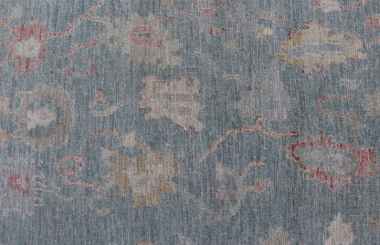 Measures: 3'11 x 5'11 Modern Oushak Rug with a Light Blue - Gray Field With All - Over Floral Motifs. Keivan Woven Arts; rug AWR - 12302 Country of Origin: Afghanistan Type: Oushak Design: All - Over, Floral. Hand - Knotted in wool, this rustic piece hold... - Keivan Woven ArtsAWR - 12302 - 23241Rug