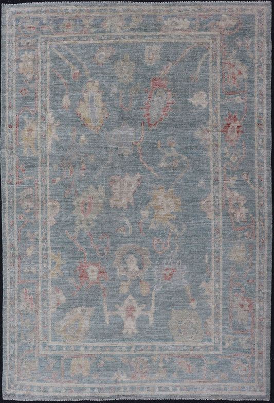 Measures: 3'11 x 5'11 Modern Oushak Rug with a Light Blue - Gray Field With All - Over Floral Motifs. Keivan Woven Arts; rug AWR - 12302 Country of Origin: Afghanistan Type: Oushak Design: All - Over, Floral. Hand - Knotted in wool, this rustic piece hold... - Keivan Woven ArtsAWR - 12302 - 23241
