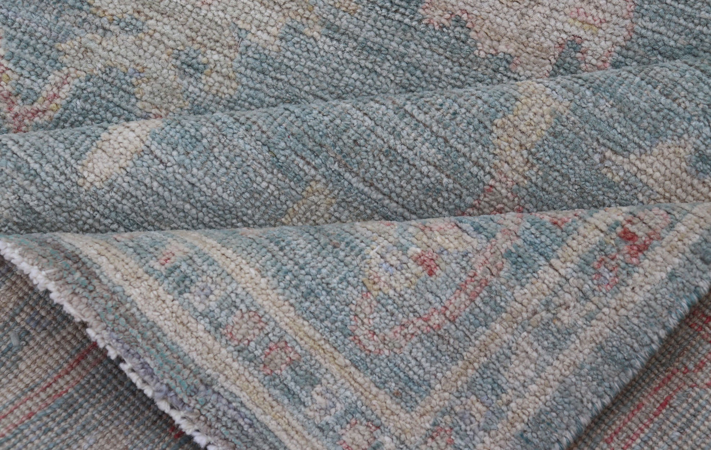 Measures: 3'11 x 5'11 Modern Oushak Rug with a Light Blue - Gray Field With All - Over Floral Motifs. Keivan Woven Arts; rug AWR - 12302 Country of Origin: Afghanistan Type: Oushak Design: All - Over, Floral. Hand - Knotted in wool, this rustic piece hold... - Keivan Woven ArtsAWR - 12302 - 23241Rug