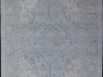 Measures: 8'10 x 11'8 Modern Designed Rug With A Light Blue Background and Tribal Medallion Motifs. Keivan Woven Arts; rug AWR - 12323 Country of Origin: Afghanistan Type: Oushak Design: Floral, Medallion Abstract - Tribal This Oushak presents ... - Keivan Woven ArtsAWR - 12323 - 23396