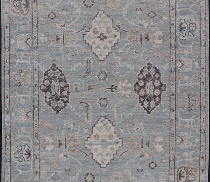 Measures: 4'1 x 6'1 Light Blue - Gray Background Modern Oushak with All - Over Tribal Motifs With Gray. Country of Origin: Afghanistan; Type: Oushak; Design: Medallion, Tribal Medallion, All - Over; Keivan Woven Arts: rug AWR - 12335 21st Century. This... - Keivan Woven ArtsAWR - 12335 - 23246