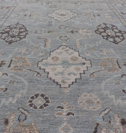 Measures: 4'1 x 6'1 Light Blue - Gray Background Modern Oushak with All - Over Tribal Motifs With Gray. Country of Origin: Afghanistan; Type: Oushak; Design: Medallion, Tribal Medallion, All - Over; Keivan Woven Arts: rug AWR - 12335 21st Century. This... - Keivan Woven ArtsAWR - 12335 - 23246