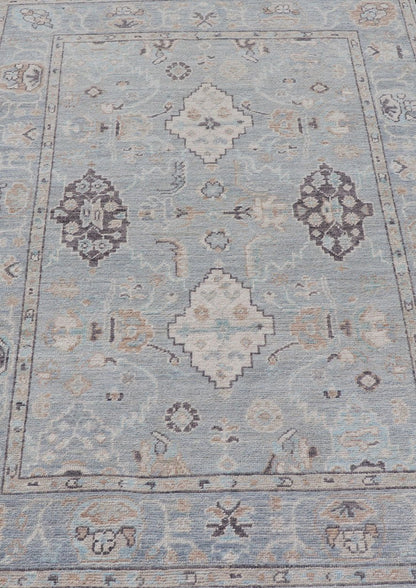Measures: 4'1 x 6'1 Light Blue - Gray Background Modern Oushak with All - Over Tribal Motifs With Gray. Country of Origin: Afghanistan; Type: Oushak; Design: Medallion, Tribal Medallion, All - Over; Keivan Woven Arts: rug AWR - 12335 21st Century. This... - Keivan Woven ArtsAWR - 12335 - 23246
