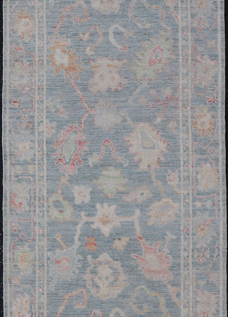 Measures: 2'6 x 7'11 Floral Modern Oushak with Muted Blue Background in Wool With All - Over Design. Keivan Woven Arts; rug AWR - 12346 Country of Origin: Afghanistan Type: Oushak Design: All - Over, Floral Runner. This hand - knotted Oushak runner ... - Keivan Woven ArtsAWR - 12346 - 23252Rug